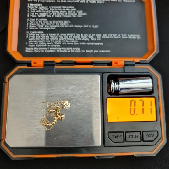 18k Bracelet with small balls and cute money catcher design as charm - Picture 15 of 16